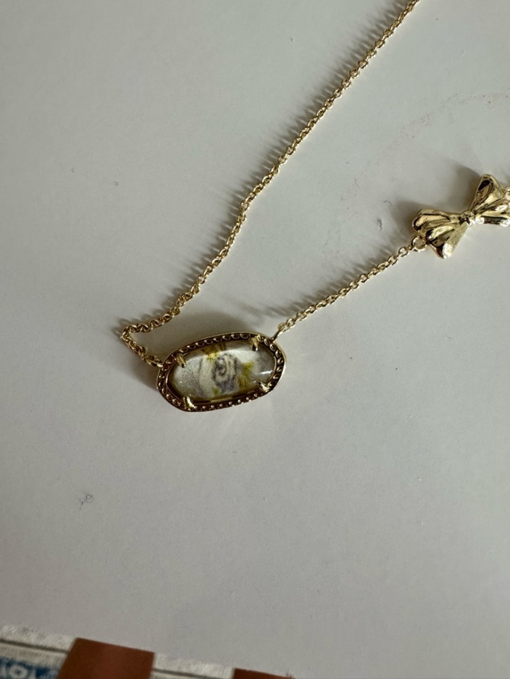 Kendra Scott Gold Oval Glass Pendant Necklace with Bow Accent
